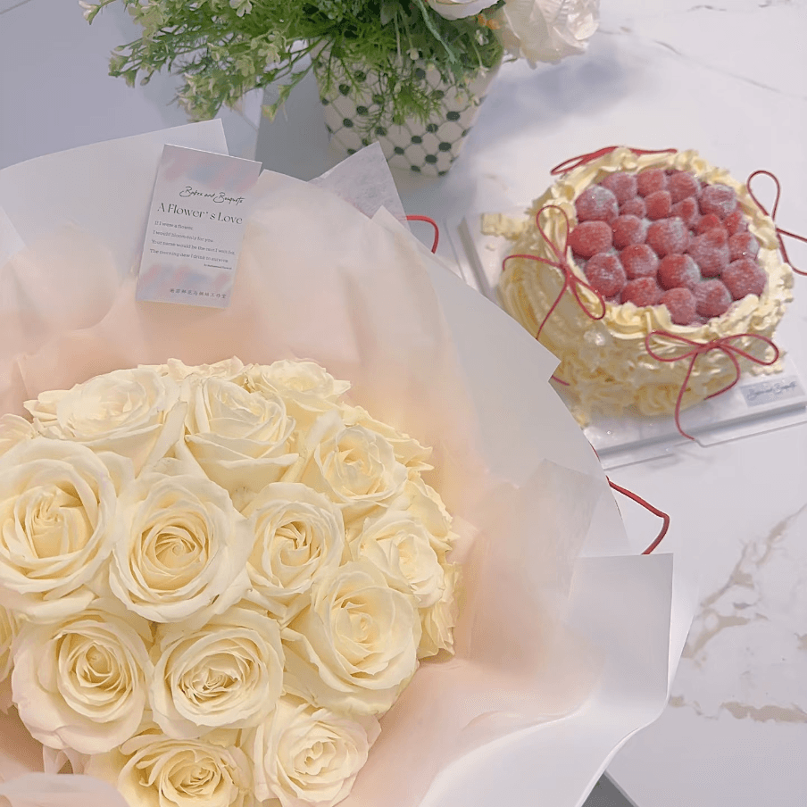8 inch cake with strawberries and 19 white roses