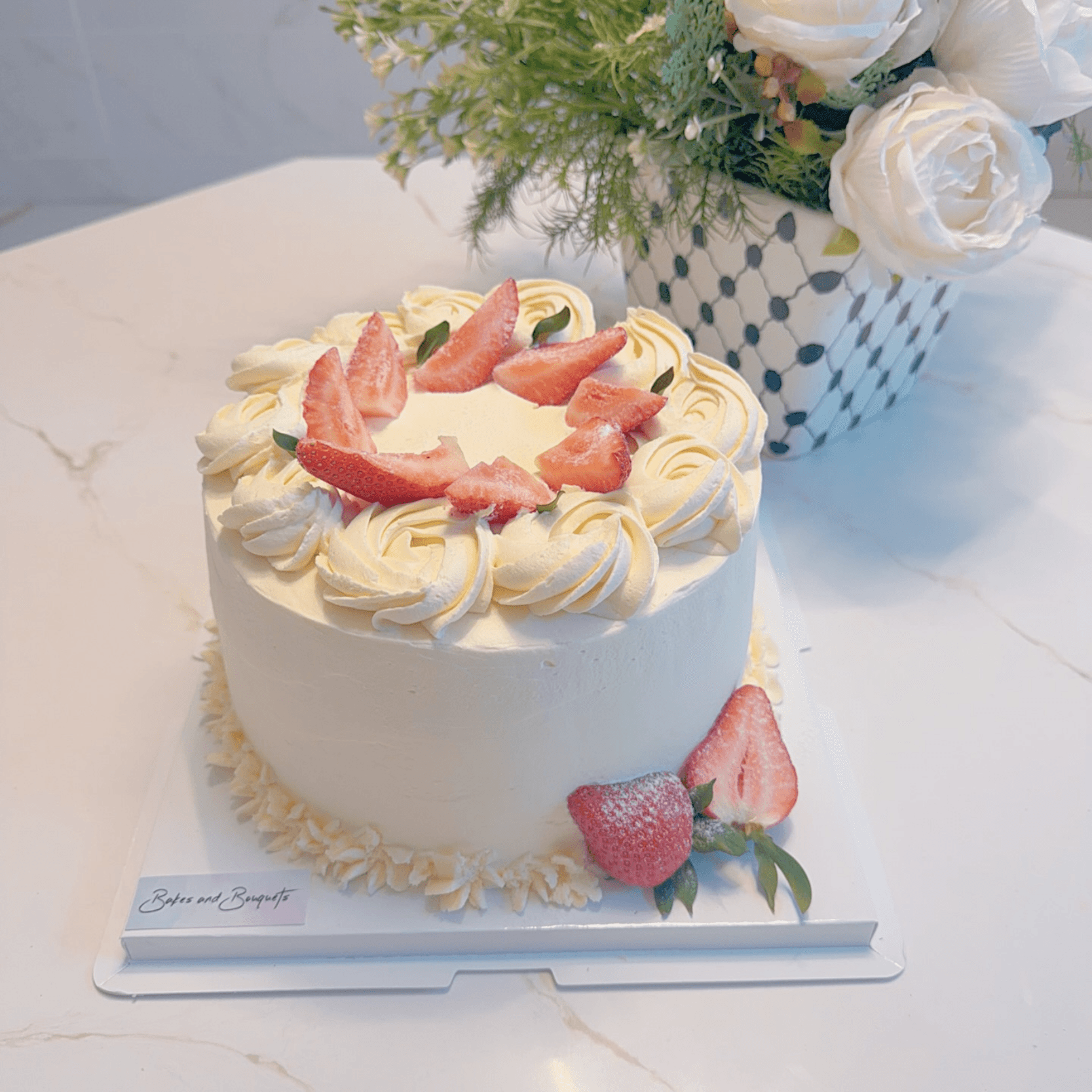 8 inch white cake with fresh strawberries